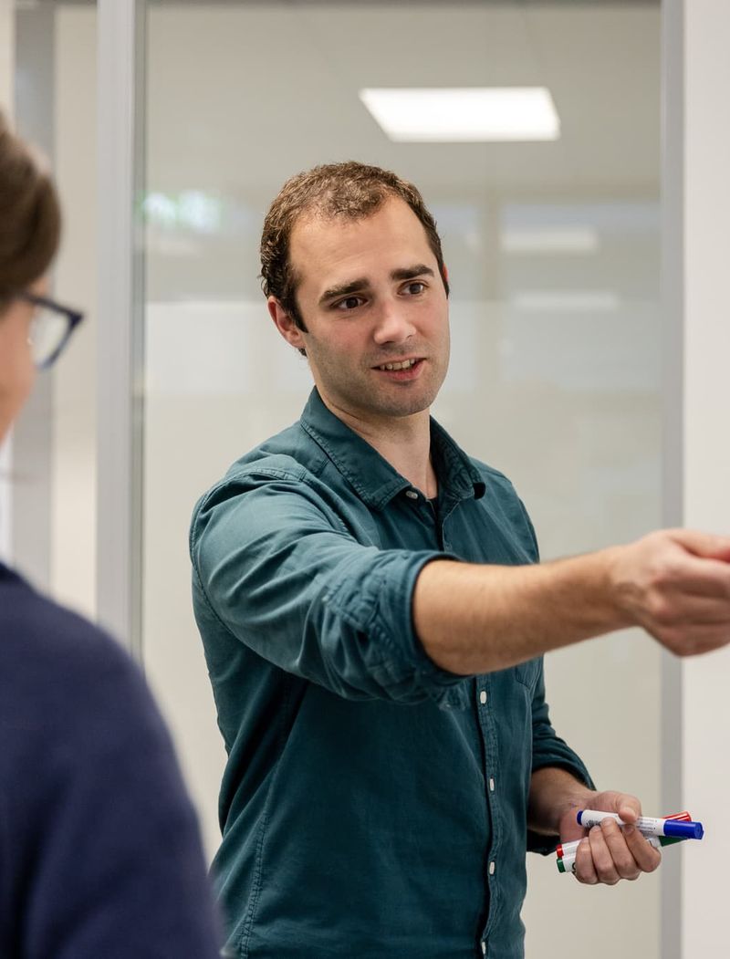 customer meering explaining Demcon services